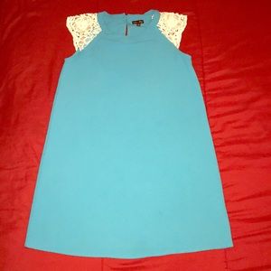I am selling a blue silk dress with flower sleeves